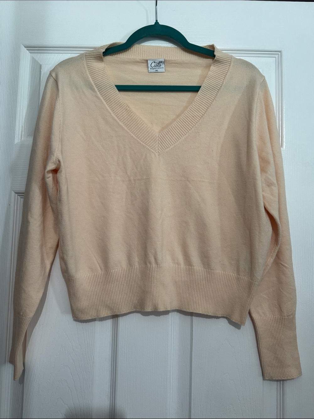 Juniors Light Cream V-Neck Sweater